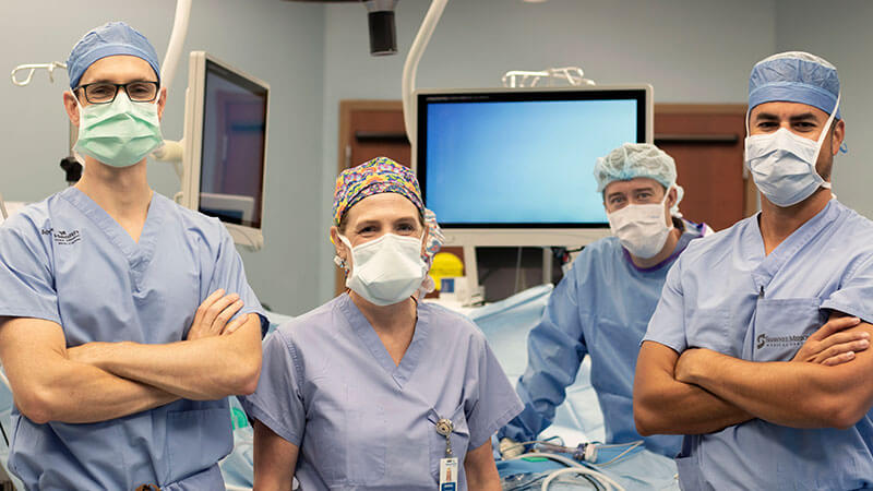 kc bariatric surgeons and providers smile from operating room after successful surgery